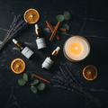 Lunara luxury candle with essential oils and botanicals flat lay